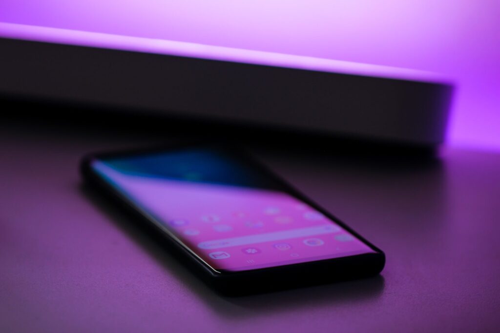 Phone with purple lighting, sexting